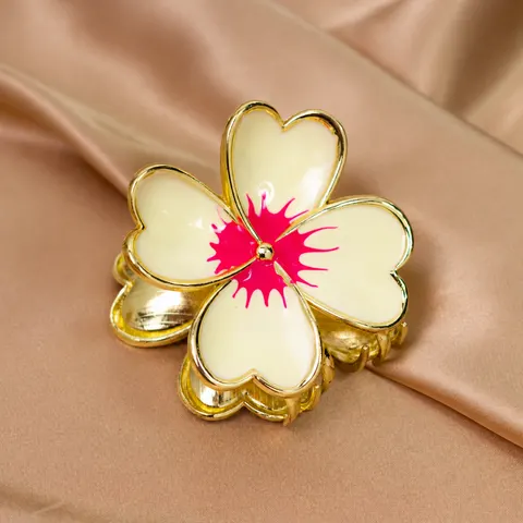 Pinza para pelo flor crema con centro fucsia