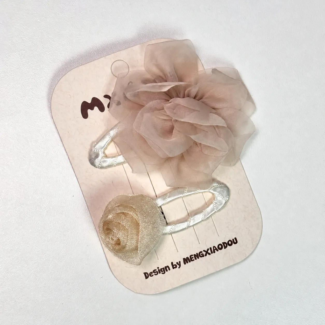 Accesorios para el cabello · Flor beige y rosa dorada · S25